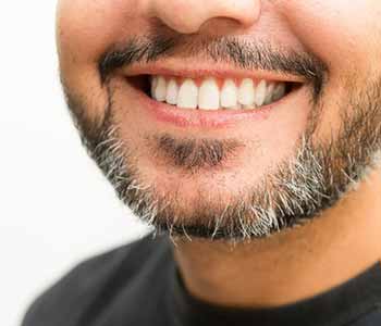 What are cosmetic dentures?