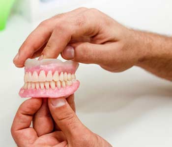 Complete Dentures Transform Patients’ Smiles
