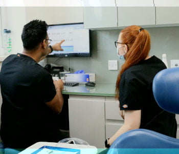 dentist looking at screen